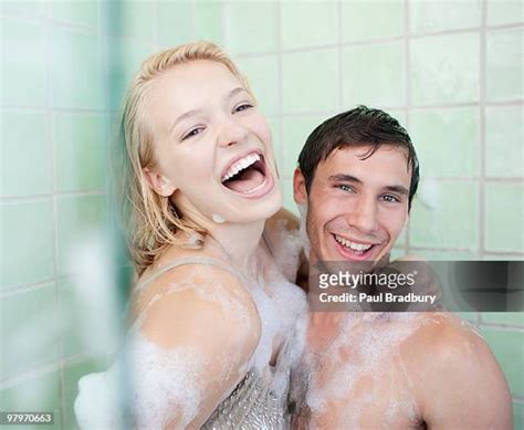 Young Couple Taking A Shower Together Superstock Young Couple Taking A Shower Together Superstock